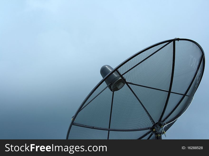 Satellite dish blue sky background