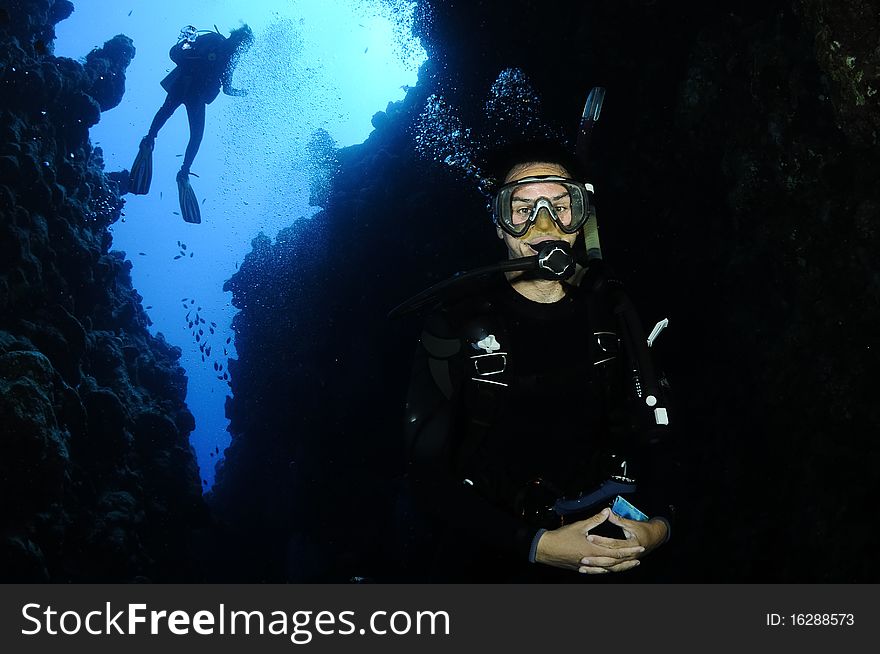 Scuba diver in underwater Canyon, Dahab, Egypt. Scuba diver in underwater Canyon, Dahab, Egypt