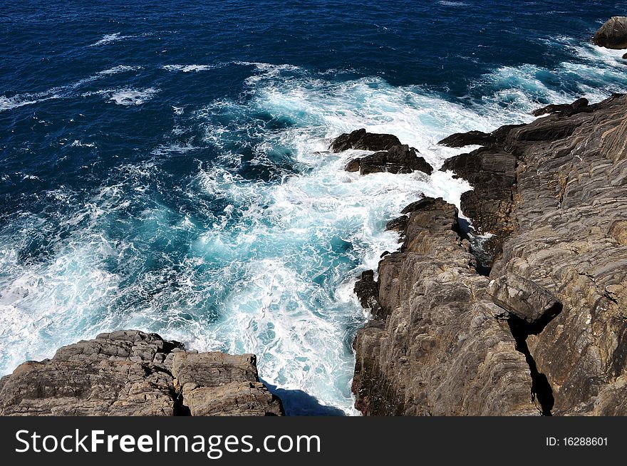 Big waves smash into rocks,  Mediterannean Sea. Big waves smash into rocks,  Mediterannean Sea