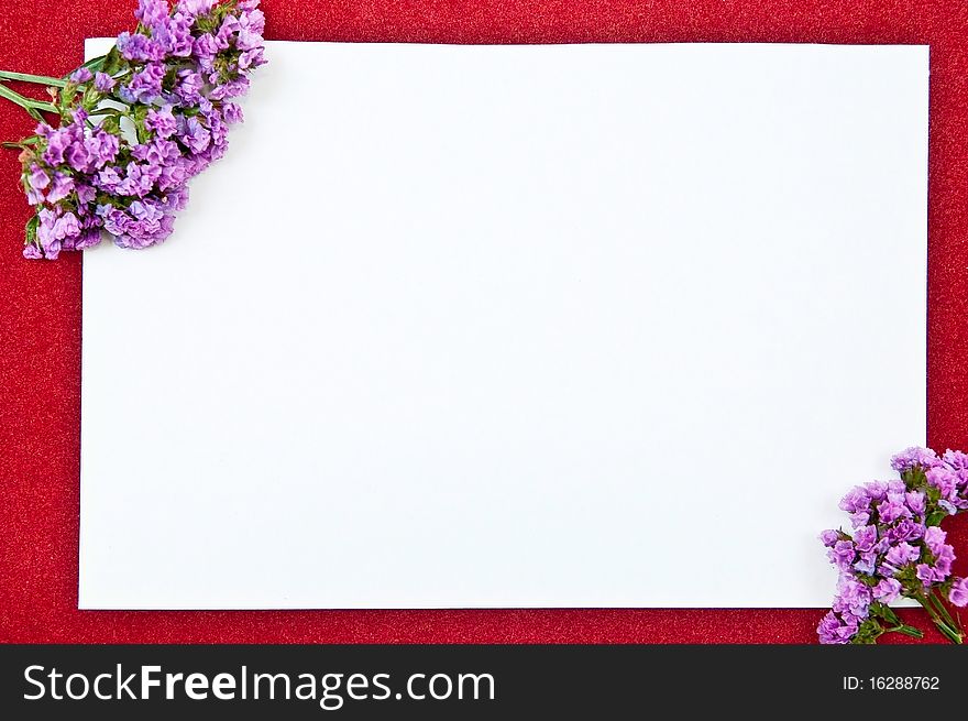 White paper blank on red with flowers design. White paper blank on red with flowers design