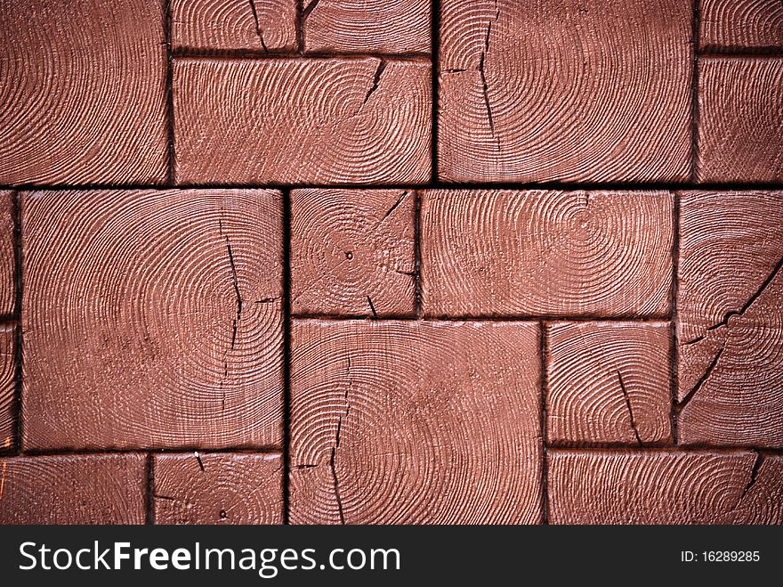 Different sizes of brown pavement tiles background