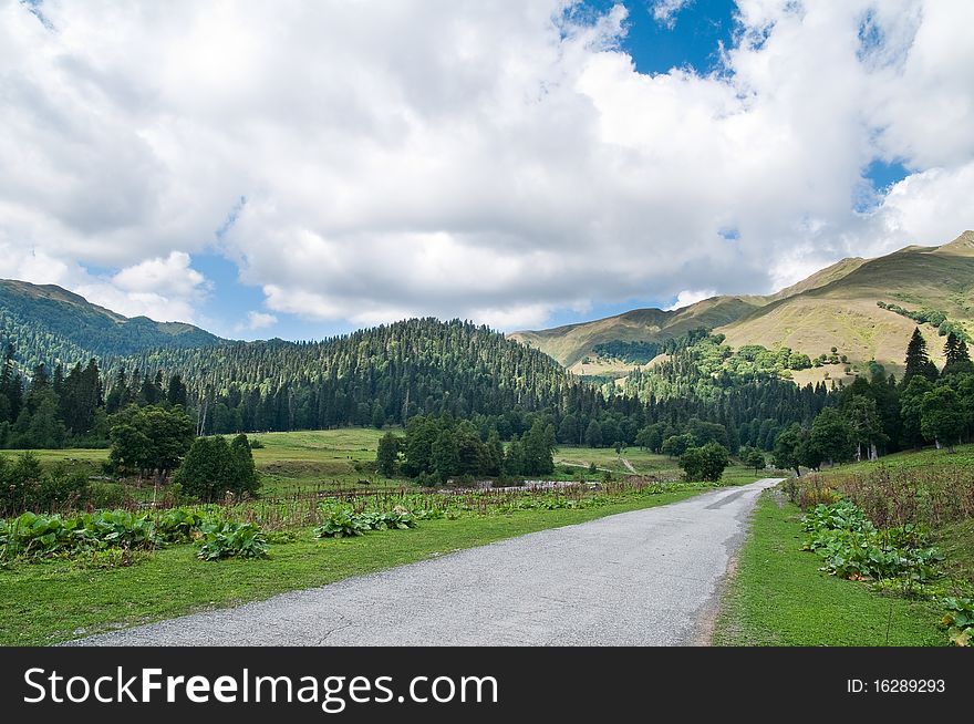 Picturesque valleys above lake Ritsa involve with the beauty and mineral sources of many tourists.Abkhazia. Picturesque valleys above lake Ritsa involve with the beauty and mineral sources of many tourists.Abkhazia.