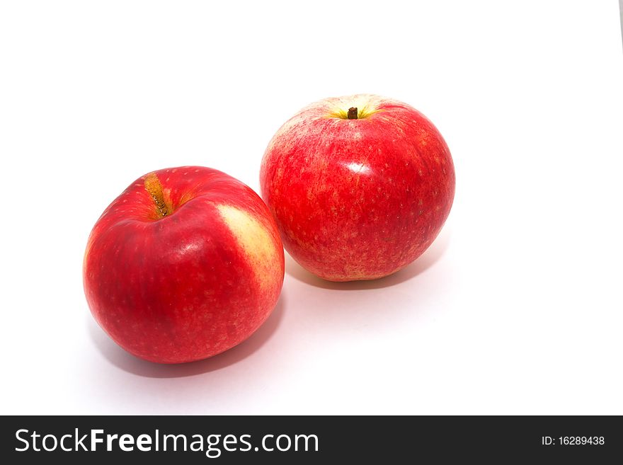 Photo of the red apples on white background