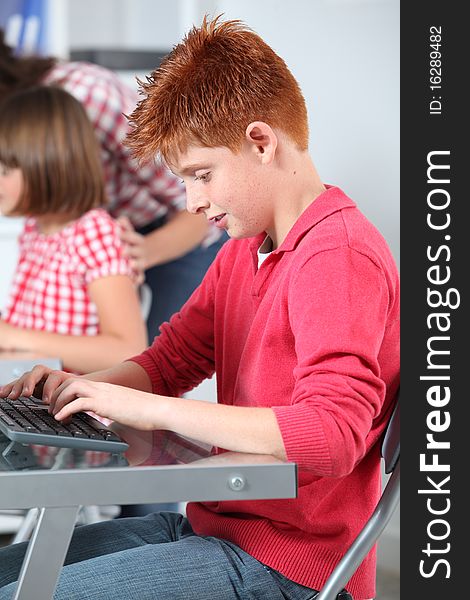 Children learning to use computer. Children learning to use computer