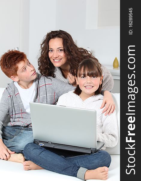 Mother and children surfing on internet. Mother and children surfing on internet
