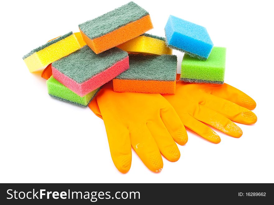 Rubber gloves and kitchen sponges on white