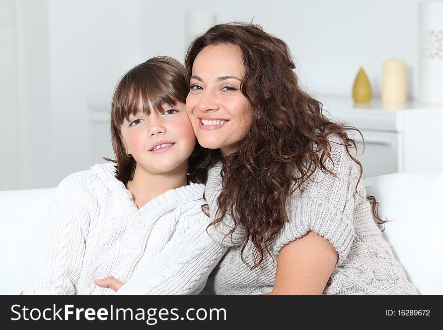 Woman and daughter at home. Woman and daughter at home