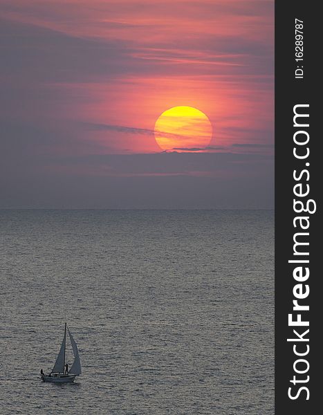 Sailing vessel going at sunset. Sailing vessel going at sunset