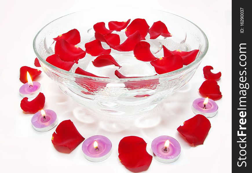 Spa lit candles rose flowers health-care treatment. Spa lit candles rose flowers health-care treatment