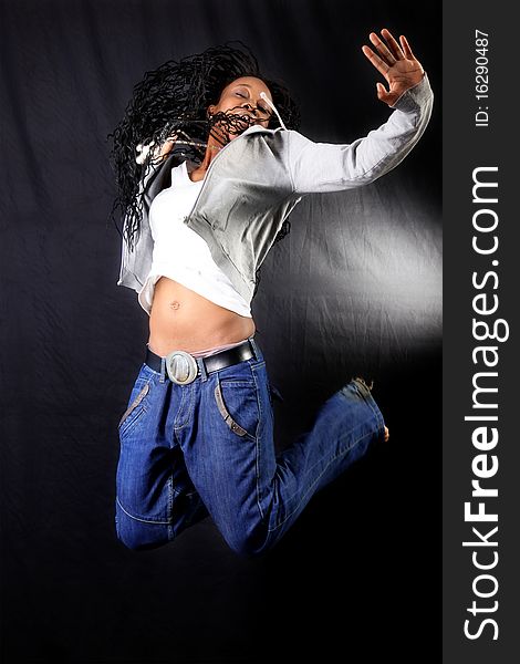 Jumping young afro american dancer. Jumping young afro american dancer