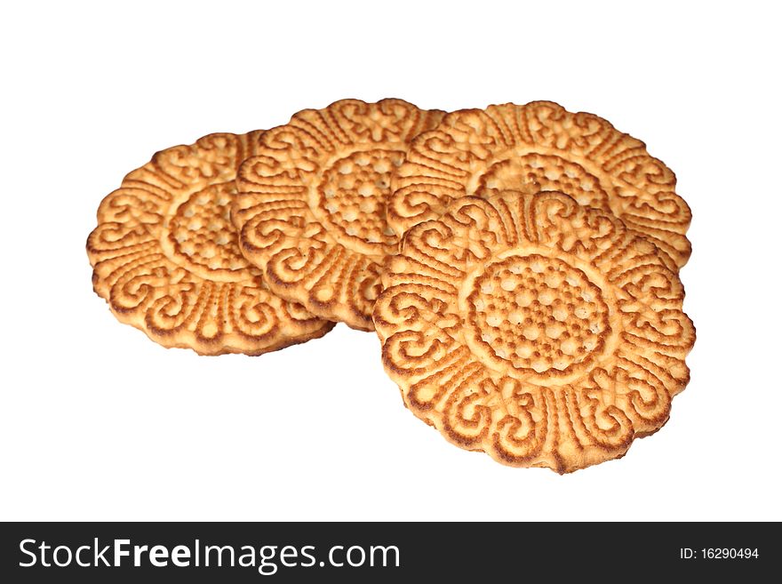 Four cookies with a pattern. Isolated on white background.