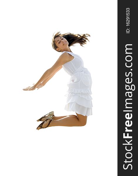 Young lady in white dress jumping. Isolated. Young lady in white dress jumping. Isolated