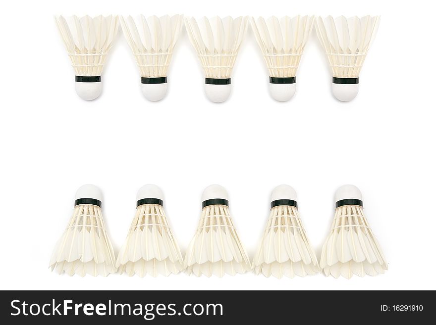 Two rows of badminton shuttlecocks on white background. Two rows of badminton shuttlecocks on white background