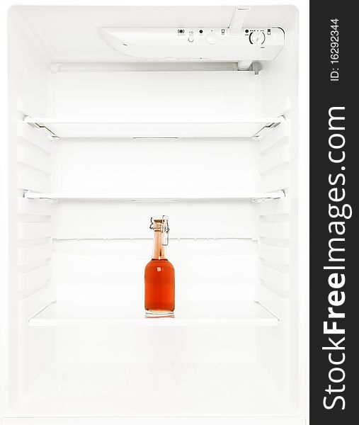 Lonely bottle in a fridge