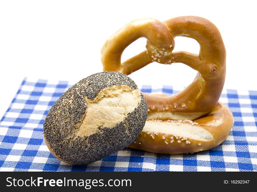 Baked foods pretzel with poppy rolls