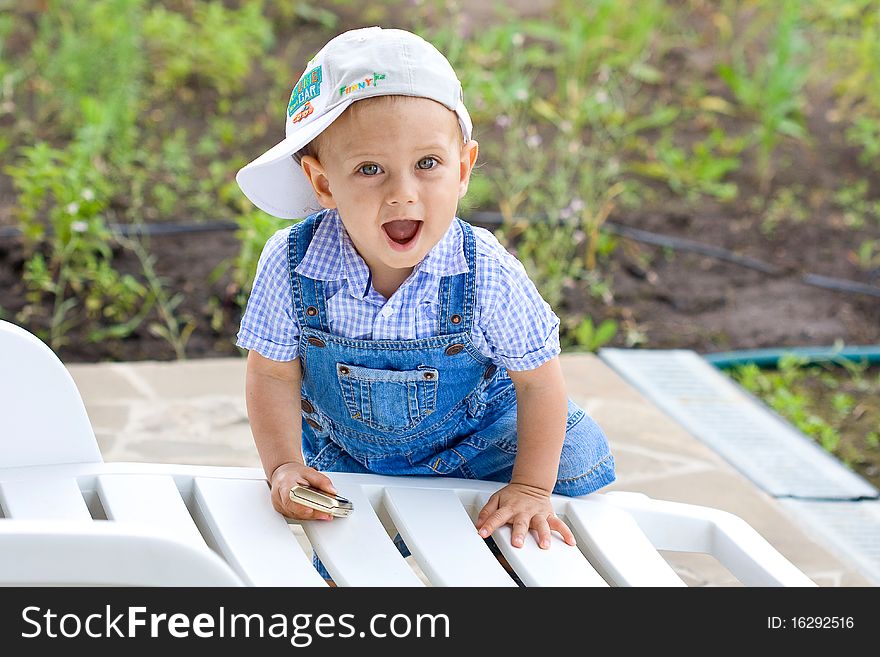 Happy child plays in park