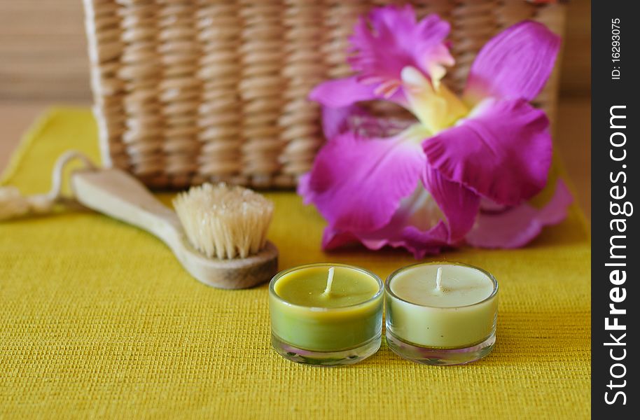 Essential  candle and flower in health spa for spa treatment.