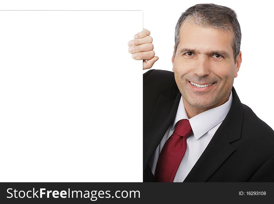 Handsome Businessman holding a blank sign in front of him