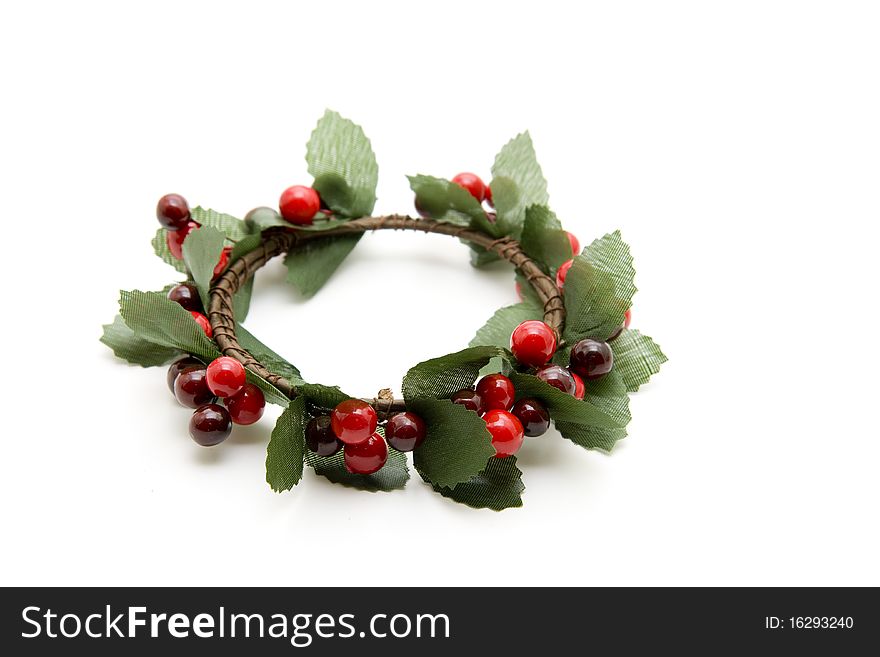Green wreath with red berries