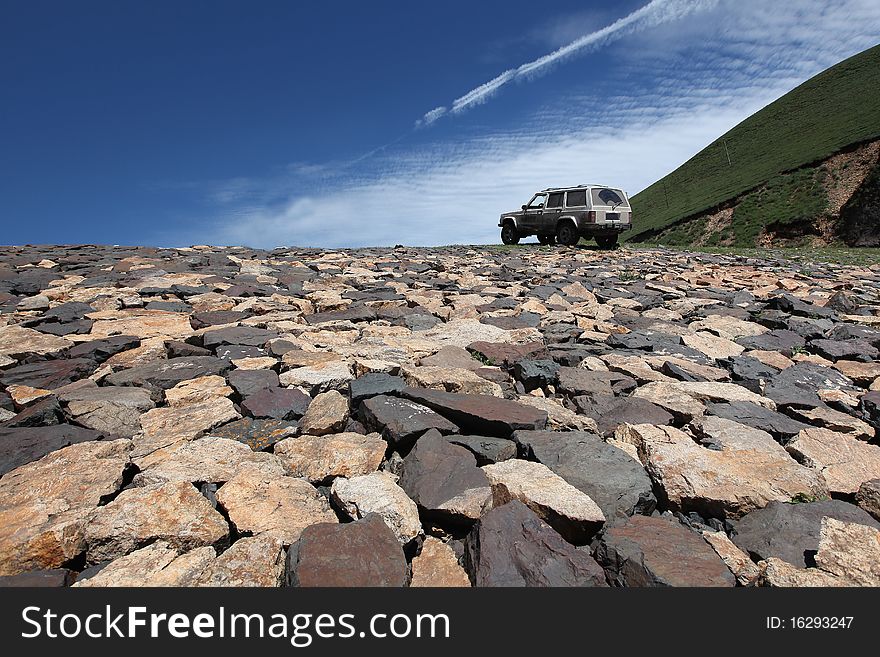 A jeep on a dam. A jeep on a dam