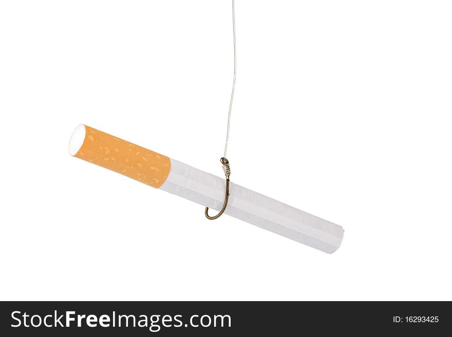 A filtered cigarette hooked to a fishing hook; addiction concept. A filtered cigarette hooked to a fishing hook; addiction concept.