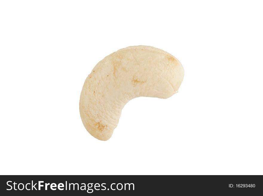 Single cashew isolated on a white background.