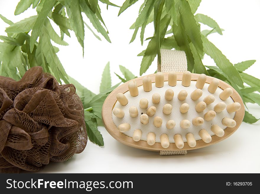 Massage brush with sponge and leaf