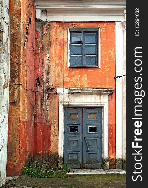 Door and window in old destroyed house