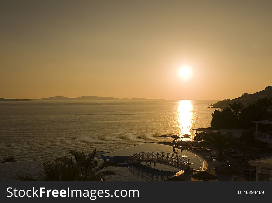 Sunset over port of Mykonos, Greece