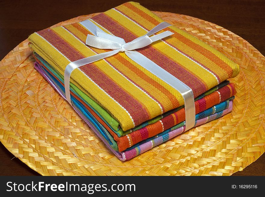 Striped cloths of different colors packaged as a gift bag. Striped cloths of different colors packaged as a gift bag