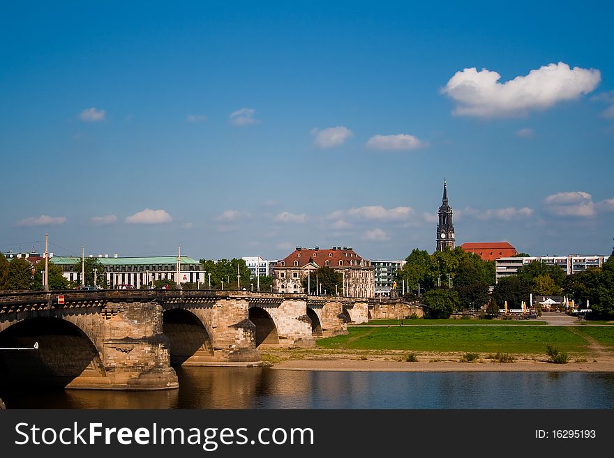 Photo of Dresden with blue sky and green grass