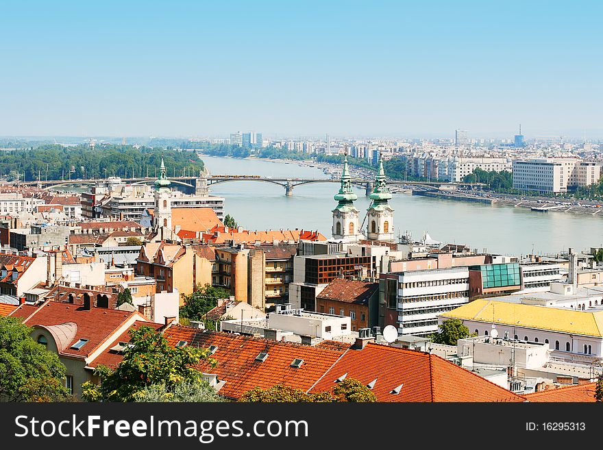 Panoramic view of Budapest including river Danube and red roofs