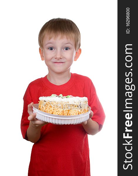 Happy boy with a cake on a white background