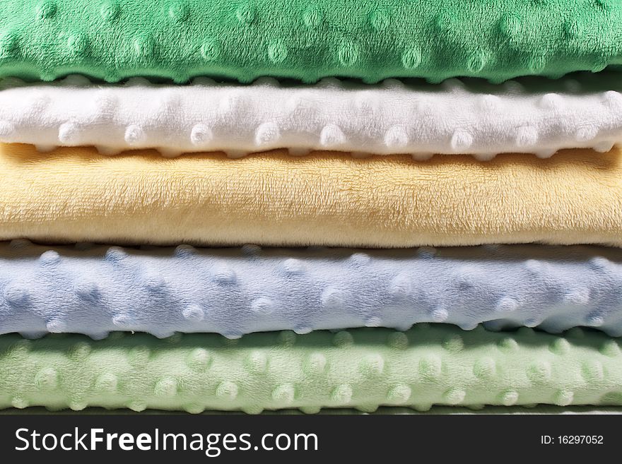 Stack of colorful and soft fabric. Stack of colorful and soft fabric.