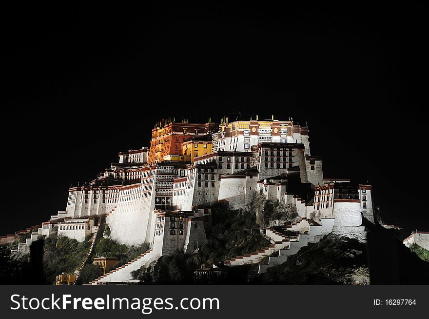 Night scenes of the famous Potala Palace in Lhasa, Tibet,isolated on a black background.