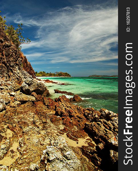 The sky, the rocks, the sand, and the water make malcapuya's shoreline such a wonder to behold. The sky, the rocks, the sand, and the water make malcapuya's shoreline such a wonder to behold.