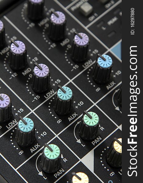 Closeup of knobs on a music mixer. Closeup of knobs on a music mixer