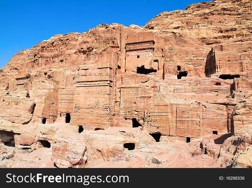 The ancient city of Petra in Jordan. It was carved out the rocks. It is now an UNESCO World Heritage Site. Jordan