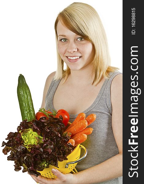 Young woman presenting fresh vegetables - isolated on white. Young woman presenting fresh vegetables - isolated on white