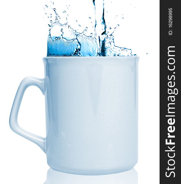 Cup with blue water isolated on a white