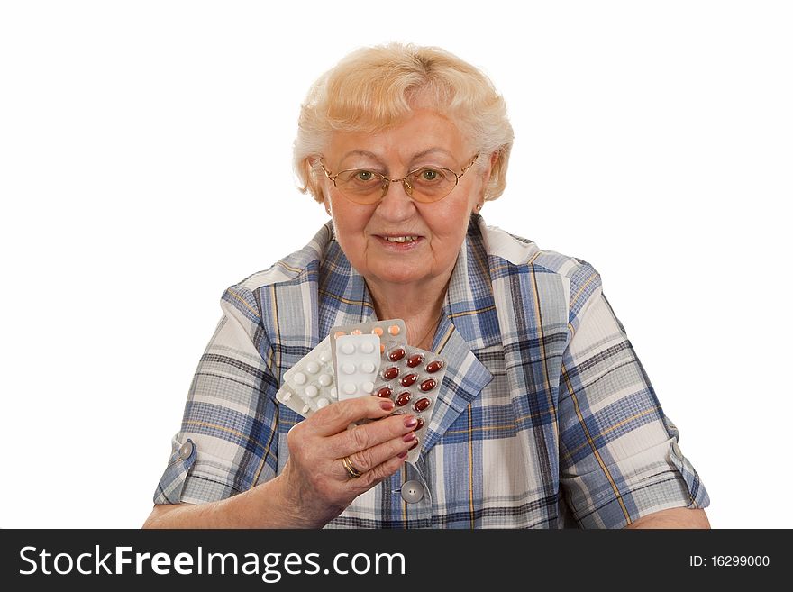 Elderly woman with medicine - isolated on white background. Elderly woman with medicine - isolated on white background