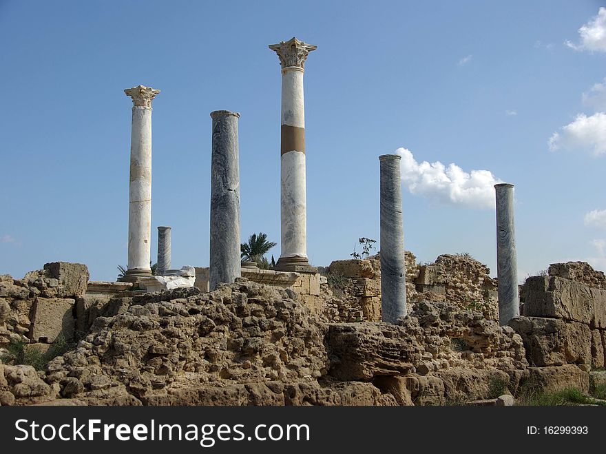 Columns in the roman ruins of Leptis Magna in Libya, in Africa. Columns in the roman ruins of Leptis Magna in Libya, in Africa