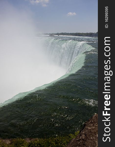 Water flowing over the edge of Horseshoe Falls, Niagara Falls, Canada. Water flowing over the edge of Horseshoe Falls, Niagara Falls, Canada.