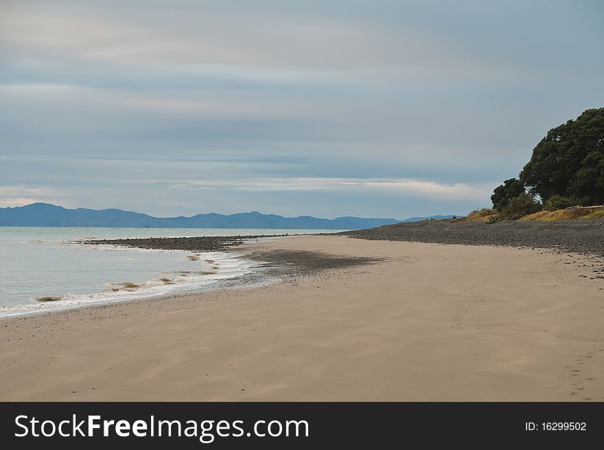 Kaiwa beach in the early morning before the sun is fully up, New Zealand. Kaiwa beach in the early morning before the sun is fully up, New Zealand