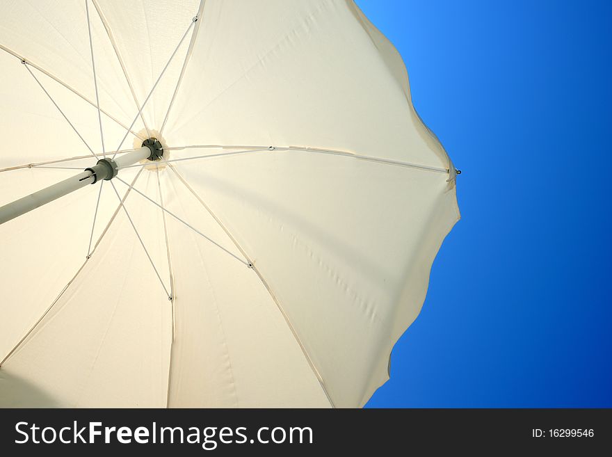 Classic beach umbrella, summer sunny day