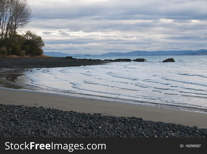 Dusk at Kaiaua beach south of Auckland in New Zealand. Dusk at Kaiaua beach south of Auckland in New Zealand