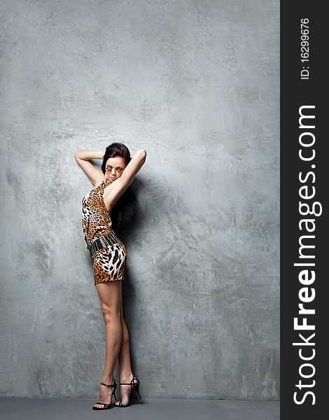 Modern style dancer posing on studio background. Modern style dancer posing on studio background