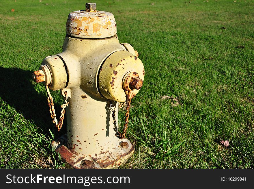 Fire hydrant with rust and chipped paint.