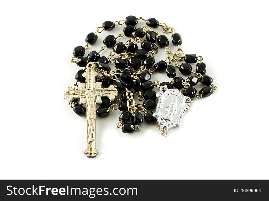 Black rosary on a white background