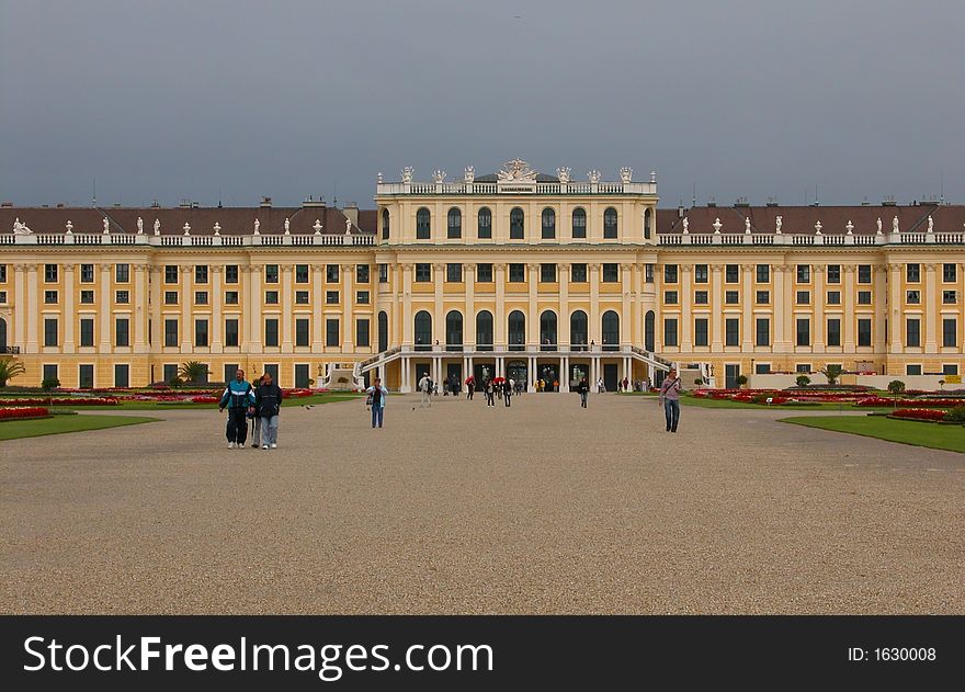 Schonbrunn Palace and gardens during a rainy day.